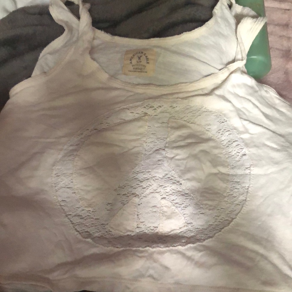 Brand new without tags American eagle, peace sign lace crop top H